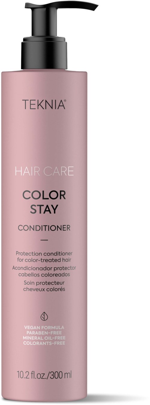 En lang rosa flaske med pumpe merket 'TEKNIA HAIR CARE COLOR STAY CONDITIONER'.
