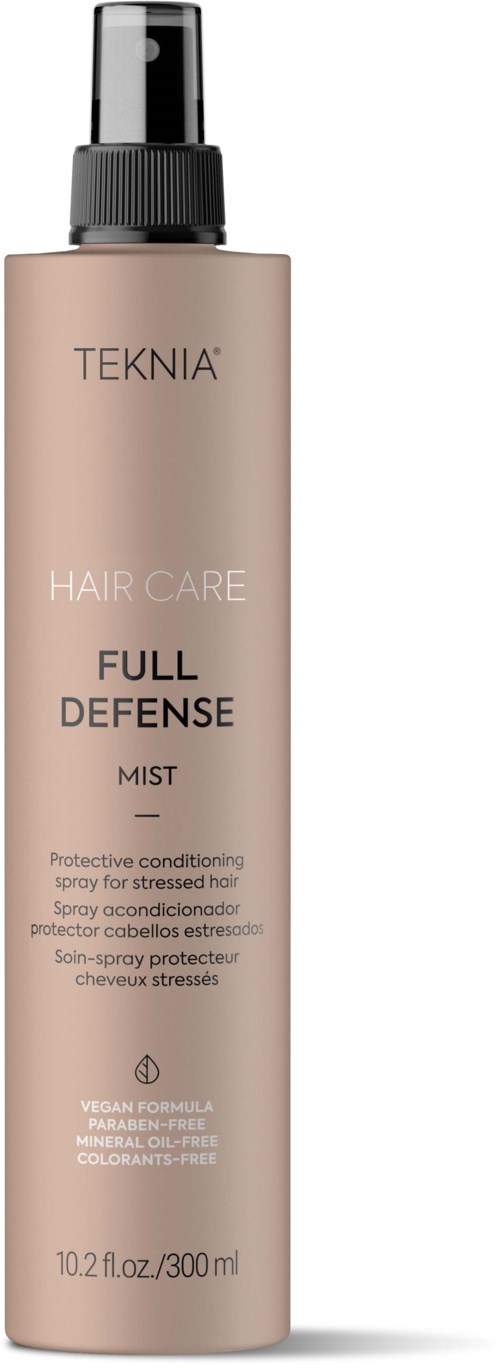 Brązowa butelka z rozpylaczem oznaczona 'Teknia Hair Care Full Defense Mist' do ochrony włosów. Pojemność 10,2 fl oz.