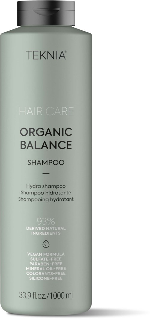 En grønn flaske med TEKNIA Organic Balance Shampoo med svart lokk, 1000 ml størrelse, merket for naturlig og vegansk hårpleie.
