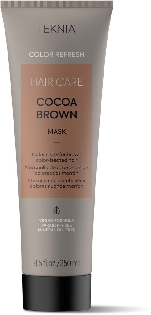 A tube of hair mask with a beige label, black cap, and text indicating it is cocoa brown color for brown hair.