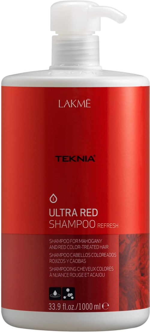 En röd flaska med vit pump, märkta 'Ultra Red Shampoo' av TEKNA, innehåller 33,9 fl oz (1000 ml).