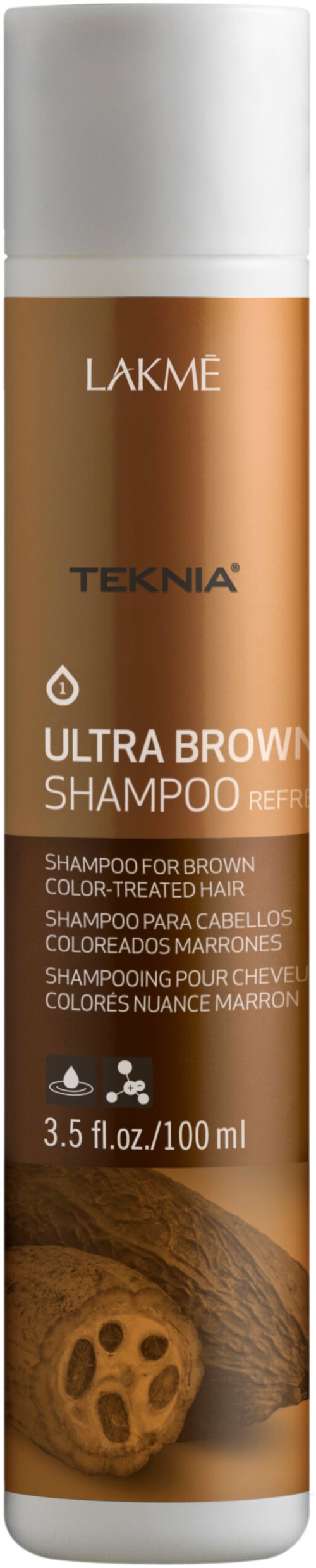 En cylinderformad flaska med Lakme Teknia Ultra Brow Shampoo för brunt, färgbehandlat hår, med brunt färg och etikettinformation.