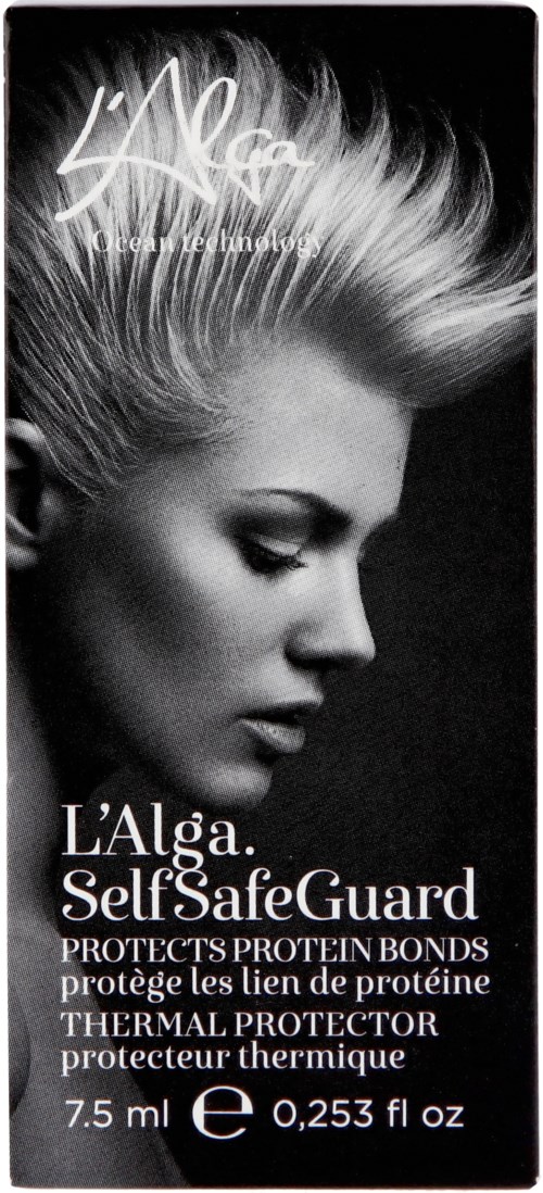 En svartvit reklam för L'Alga Self Safe Guard visar en kvinna med spetsigt blont hår och stängda ögon.
