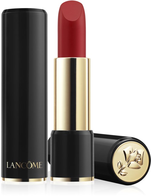 A red lipstick in a gold and black case with a floral design on the bottom.