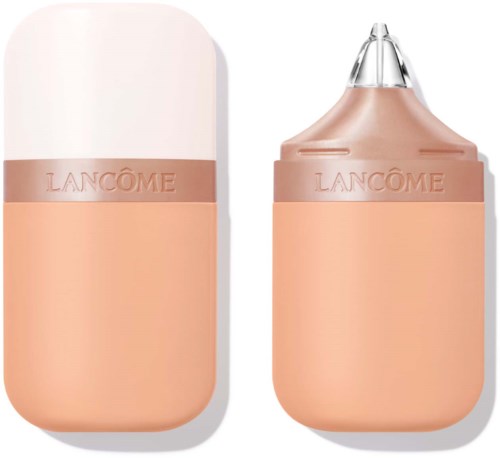 Lancôme kosmetikkapsel med applikator till höger. Ljusrosa färg och varumärkesnamn synligt.