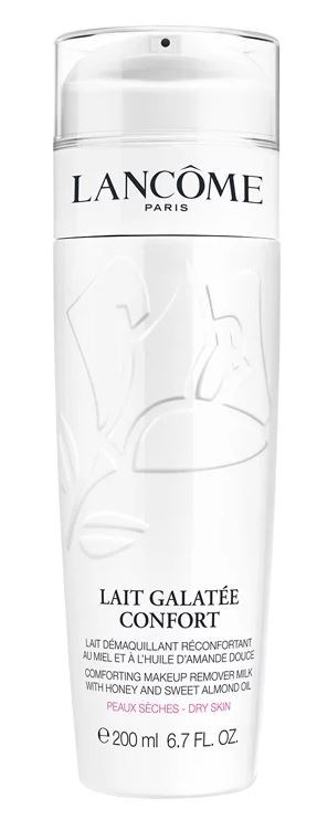 En vit flaska Lancôme makeup-remover med pump, märkt som lugnande mjölk för torr hud.