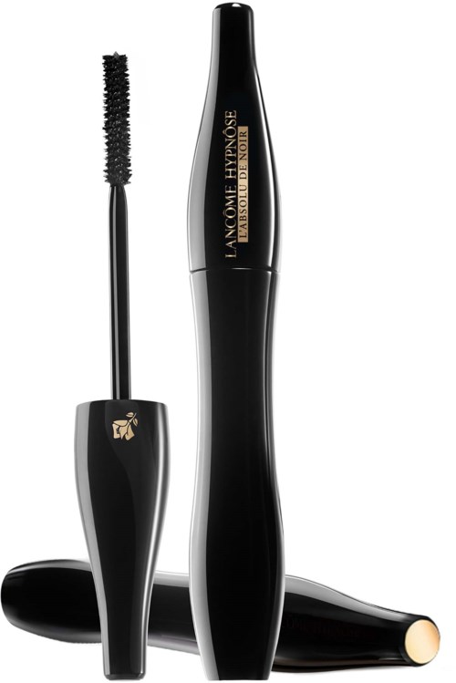 A black mascara tube with gold lettering and a brush wand. Resting on a white background.