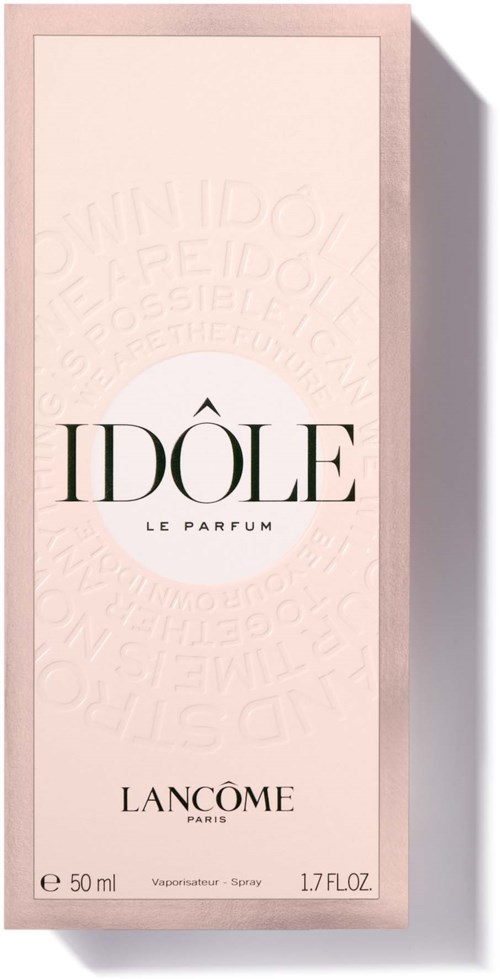 En parfymask box märkt 'IDÔLE' av Lancôme, rosa och vit, med ord präglade i bakgrunden.
