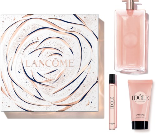 En Lancôme-presentask innehåller en låda, rosa parfym, läppglans och en ansiktskräm.