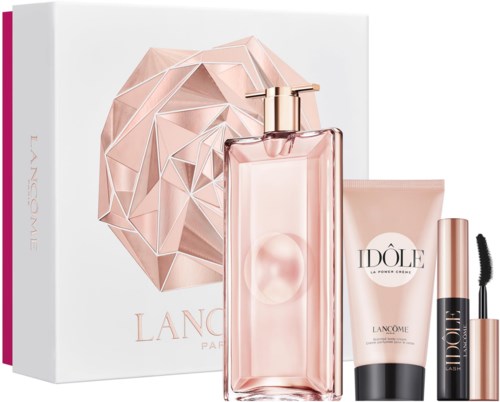 Lancome-Geschenkset mit Parfüm, Creme und Mascara in zartrosa und goldener Verpackung.