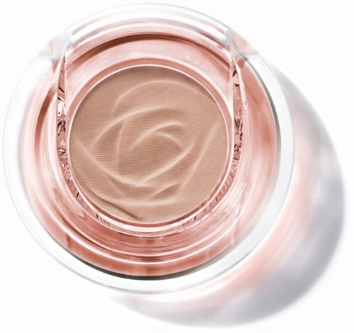 A makeup container with a pinkish beige compact inside, viewed from above.