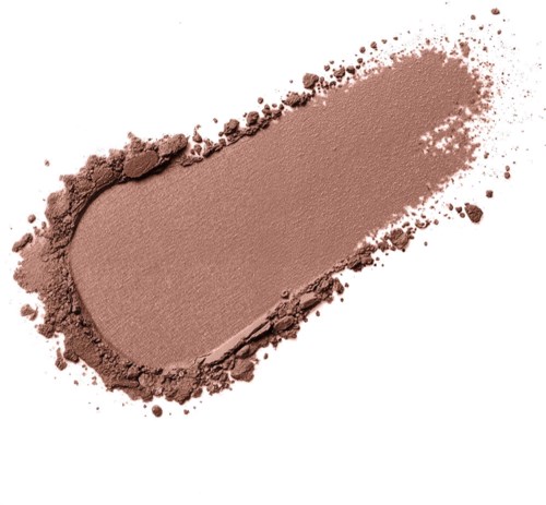A tan powder spread out in a streak with scattered powder around it.