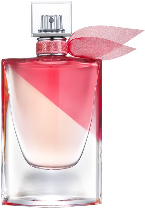 En rosa och genomskinlig parfymflaska med ett rosa band och en klar caps.
