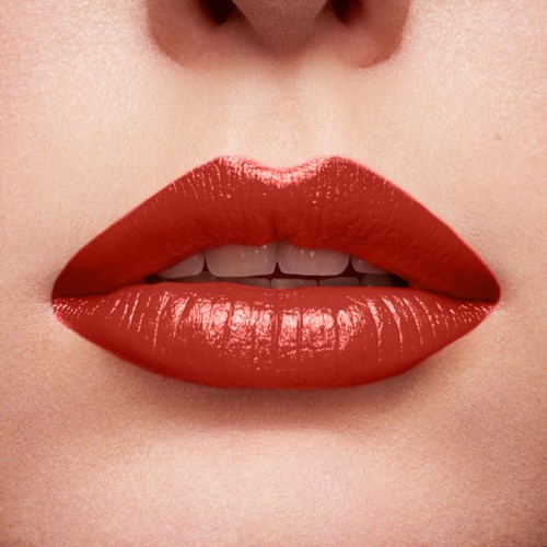 Close-up of full lips with bright red lipstick and slightly open mouth showing white teeth.