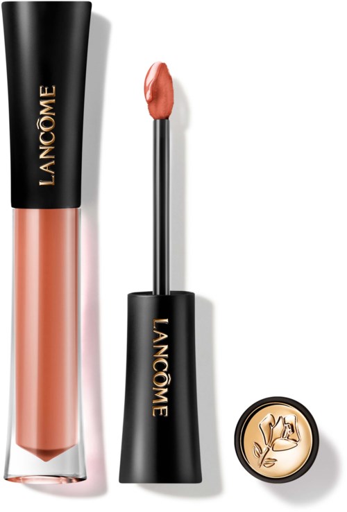 Lancôme lipgloss tube, kwastje met perzikkleurige glans en een kleine ronde logo met een bloem en de naam Lancôme.