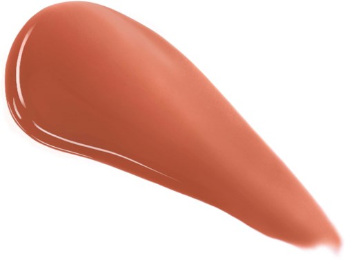 Een kleurstaal van crème of vloeibare make-up in een warme beige tint. Glad op een witte achtergrond.