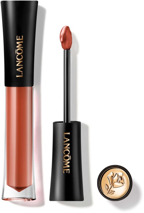 Lippenbalsemtube, applicator met perzikkleurige glans en een kleine ronde deksel met bloemlogo.