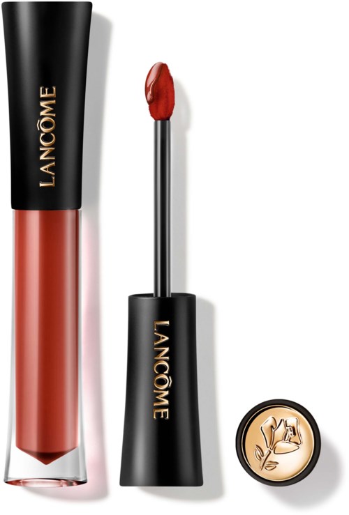 Lippengloss tube, applicator met rode gloss, en kleine ronde lipgloss container met bloemontwerp.