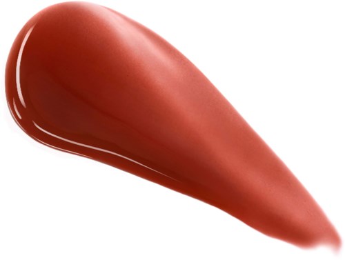Een likje bronzer of blush in perzikachtige tint met een gladde textuur.