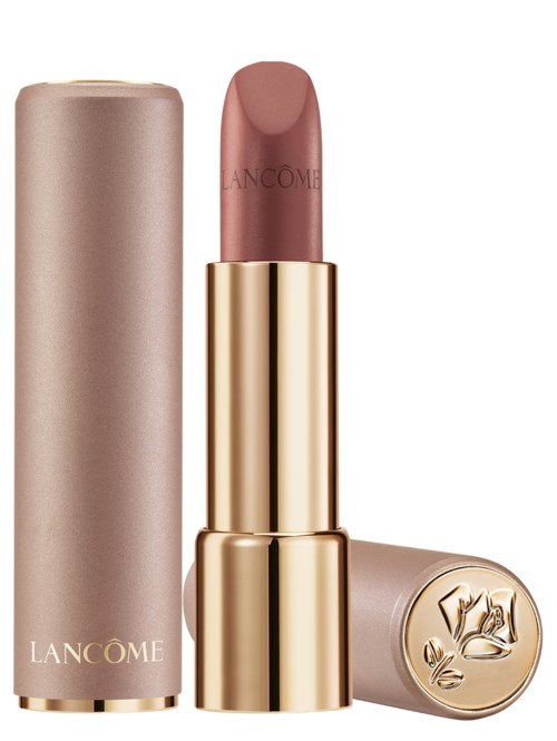 Ett läppstift i ett beige fodral med gulddetaljer, locket är avtaget och visar rosa läppstift inuti.