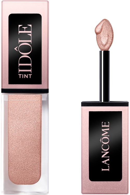 Lancômen huulikiilto tai balsami, jossa on vaaleanpunainen kiilto ja pakkauksessa brändin nimi ja tuote.