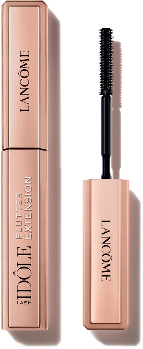 En rosa leppestiftboks med en børste, merket Lancôme og Estee Lauder Extension, står oppreist.