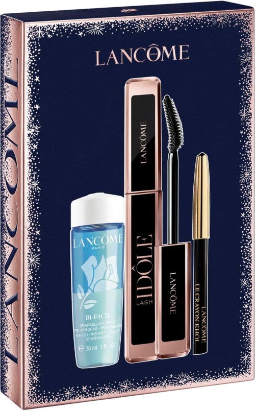 Ein Lancôme-Beauty-Set mit Wimperntusche, Lipgloss und einer kleinen Hautpflegeflasche in einer dekorierten Box.