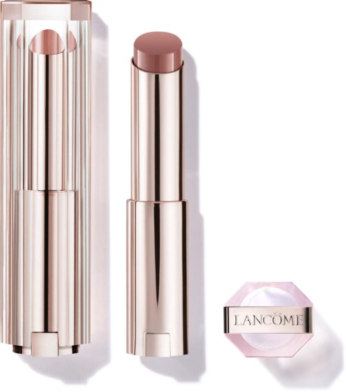 En beige leppestift i et elegant, skinnende gullfarge og dens rosa eske med 'LancDame' skrevet på.