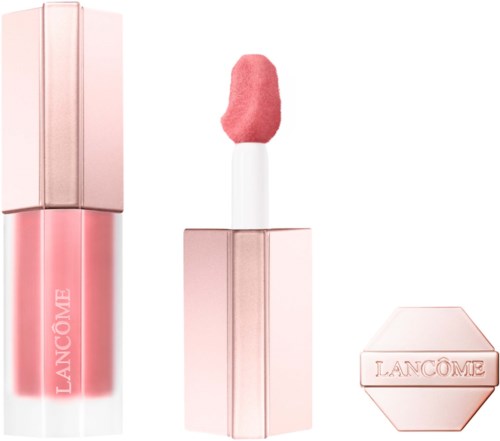Pink lipstick with a matching gloss and a small compact case. All have a soft, elegant look.