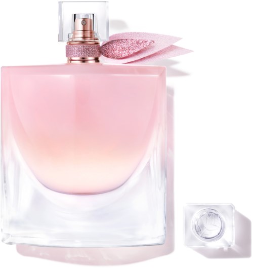 Eine pinkfarbene Parfümflasche mit Zerstäuber, glitzernder pinker Deckel und separater klarer Deckel.