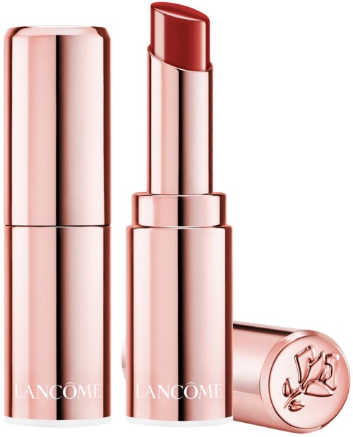 Et luksuriøst rosa leppestift med en rose-illustrasjon på lokket, delvis åpen viser leppestiftet innvendig.