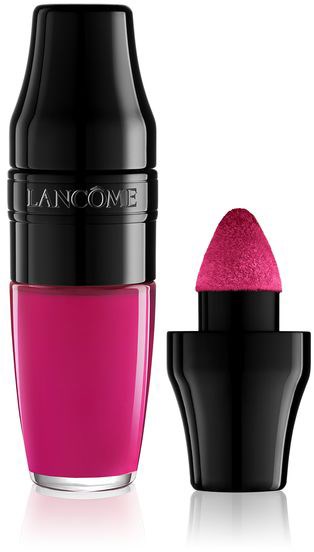 En rosa läppstift i ett svart rör med en rund topp och en rosa applikator.