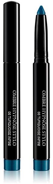 Sort læbepen med turquoise spids og mærkat, står oprejst, uden låg, der viser spidsen.
