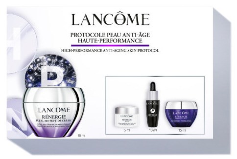 Ett Lancôme hudvårdsset med flaskor, burkar och en box, främjar anti-aging hudvård.