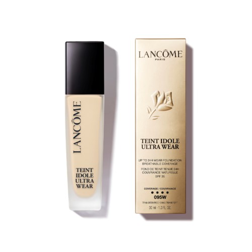 Butelka podkładu Lancôme Teint Idole Ultra Wear z pudełkiem, oba w kolorze kremowym z czarnym i złotym tekstem.