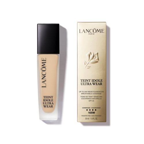 Butelka podkładu Lancôme obok opakowania, z beżową cieczą i czarnym wieczkiem.