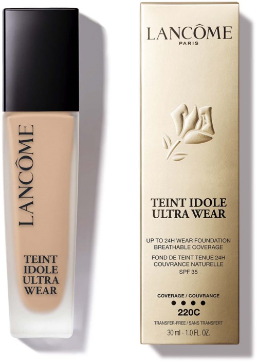 Butelka i opakowanie podkładu Lancome Teint Idole Ultra Wear, oba beżowe z czarnymi i złotymi szczegółami.