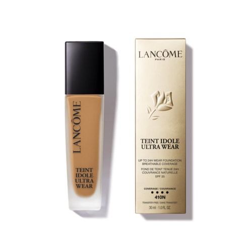 Pomadka i opakowanie w kolorze beżowym, czarny korek, logo Lancôme. Podkreśla rodzaj podkładu i numer odcienia 410.