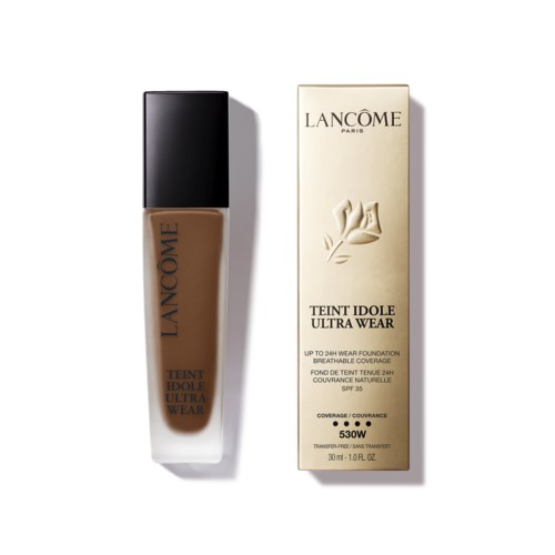Butelka podkładu Lancôme Teint Idole Ultra Wear obok opakowania, z danymi produktu na etykiecie.