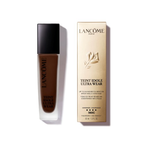 Butelka podkładu Lancôme Teint Idole Ultra Wear i jej opakowanie w kolorze beżowym z różą.
