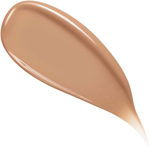 A smear of beige liquid makeup on a white background. It is smooth and slightly shiny.
