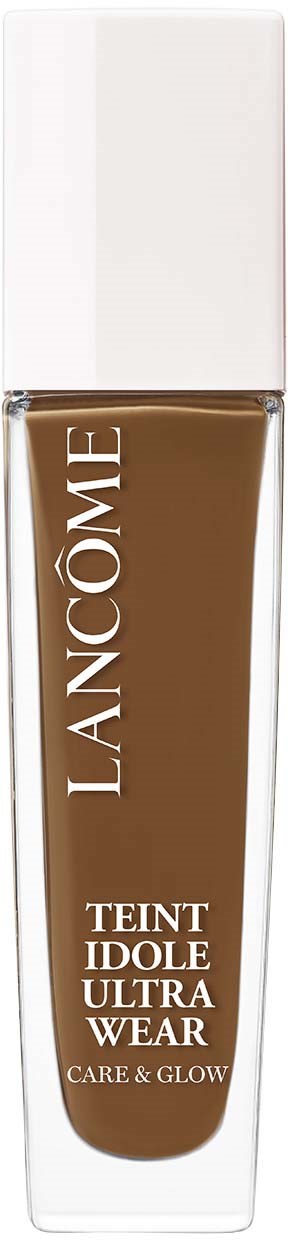A brown liquid foundation in a clear bottle with white cap, labeled 'Lancôme Teint Idole Ultra Wear'.