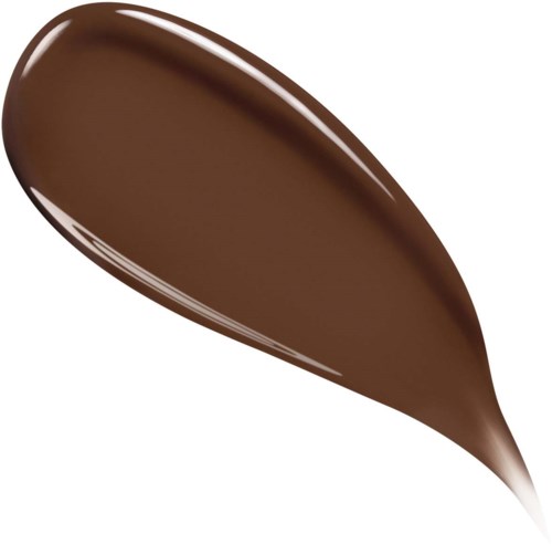 A brown, shiny, elongated object with a pointed end, possibly a leaf or petal.