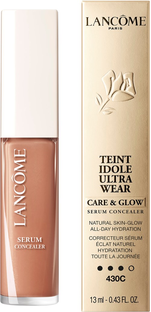 A Lancôme skincare product in a glass bottle and a cream box, labeled as serum concealer for natural, all-day hydration.