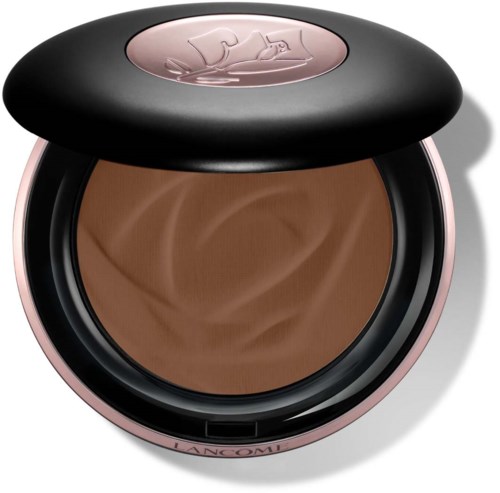 A round makeup compact with a brand name, containing brown powder and a black lid with a pink logo.