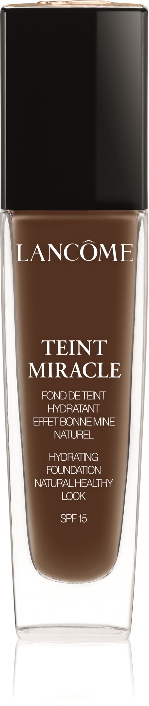 A bottle of Lancôme Teint Miracle foundation with a black cap and brown liquid inside.