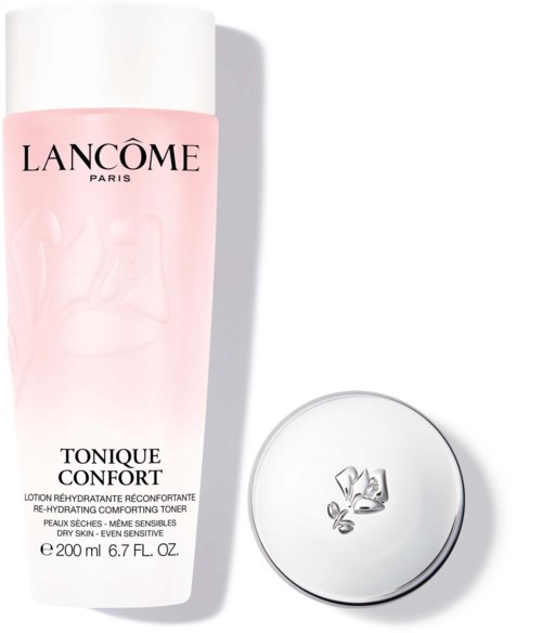 En rosa flaska med Lancôme toner med vit lock och ett runt, silver lock bredvid.