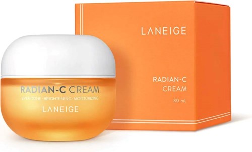 En gul-orange burk med Laneige Radian-C Cream och vit lock, och en orange ask bakom.