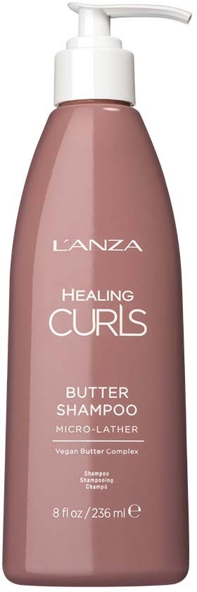 Rosa flaska av L'ANZA Healing Curls Butter Shampoo för lockigt hår, med pump och 8 fluid ounces.