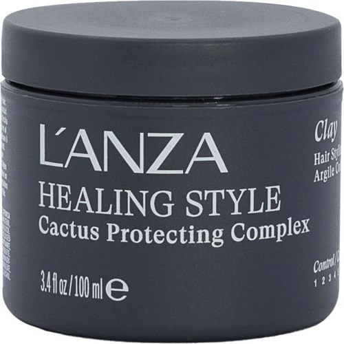 A dark gray jar of L'ANZA Healing Style hair product with a lid, label showing product details and size.